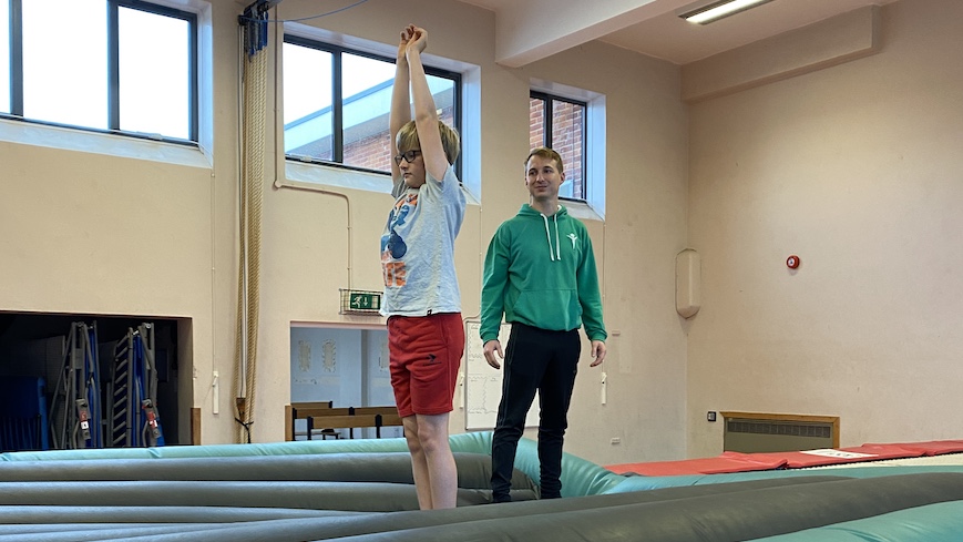 Gymnast and Coach on AirPit landing mat