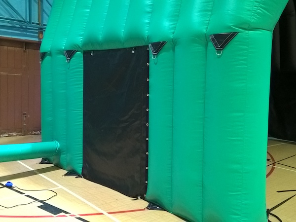 Side door of inflatable stage cover in green by MDS Leisure