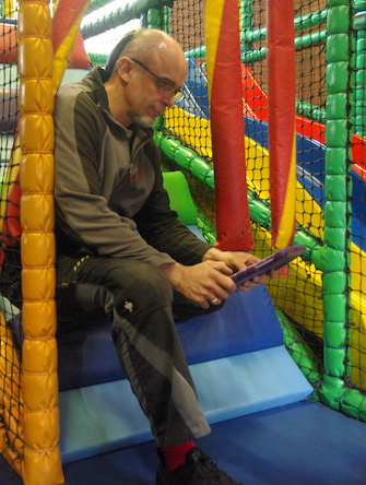 Matthew Sweed inspecting and planning a soft play system