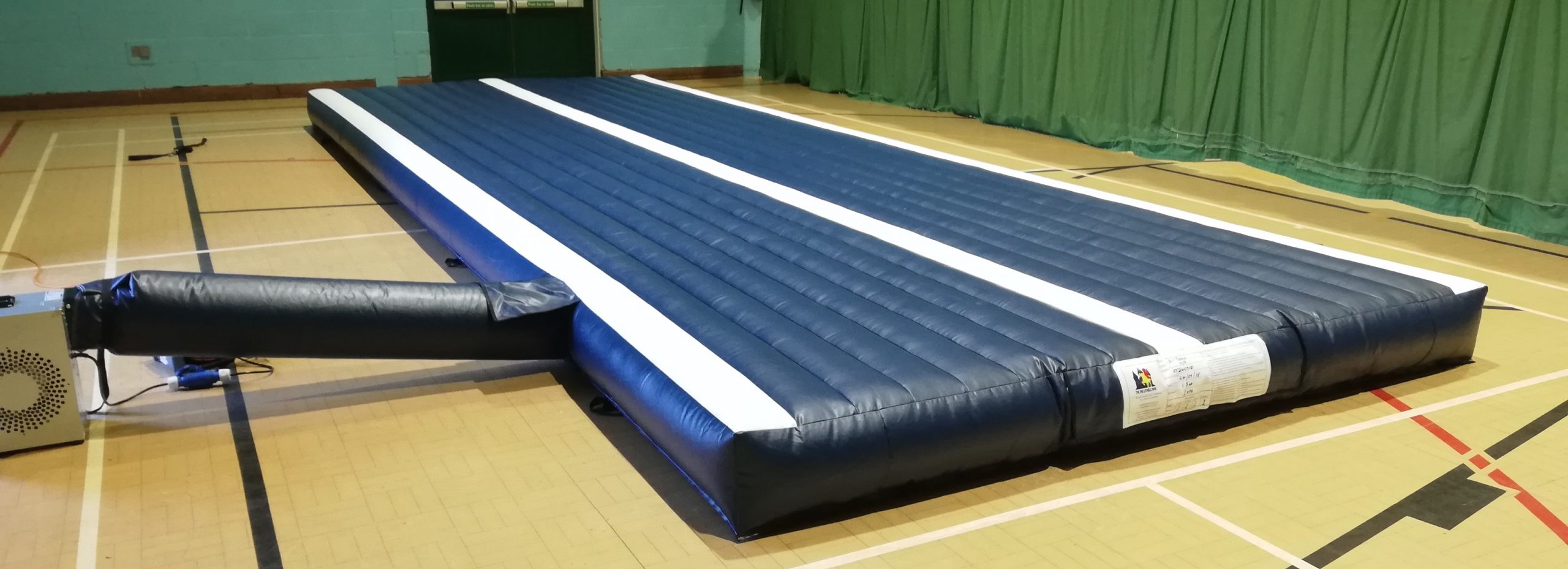 AirPit Tumble Track for gymnastics tumbling in blue with white lines